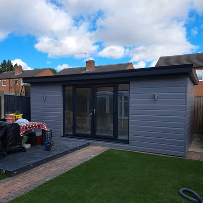 Grey-clad garden room with bifold doors completed