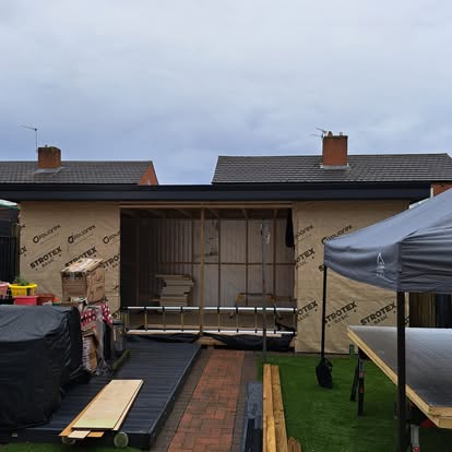 Garden room under construction with membrane and frame