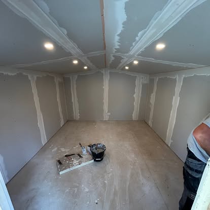 Garden room interior with coffered ceiling and lights