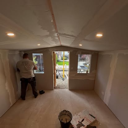 Garden room interior at plasterboarding stage
