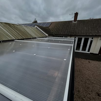 New polycarbonate carport roof on bungalow