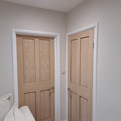 Oak 4-panel internal doors in hallway