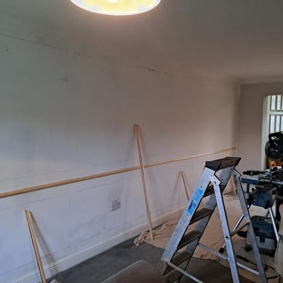 Living room dado batten fixed to wall, early stage