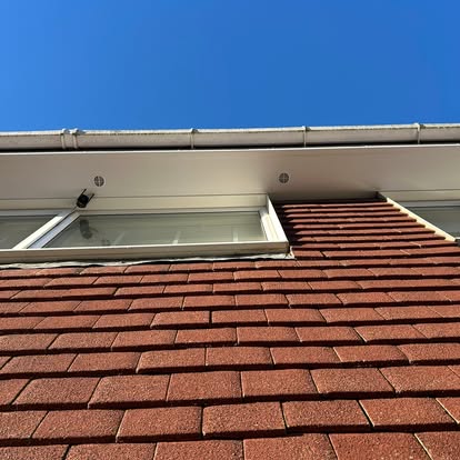 Pitched roof with new Velux window installed