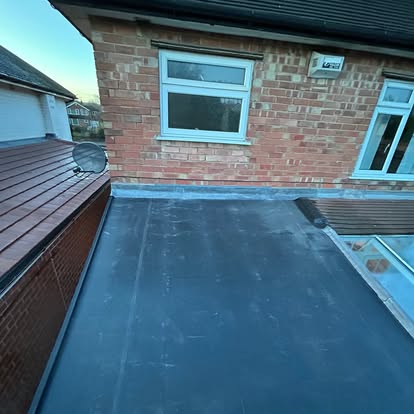 Black EPDM flat roof on rear extension with skylights