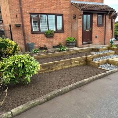 Sleeper terracing with gravel infill, mid-stage
