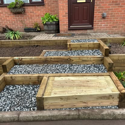 Completed timber sleeper steps and raised beds