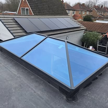 Glass pyramid roof lantern on EPDM flat roof