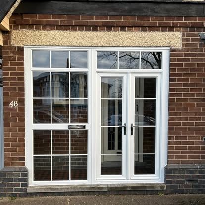New white Georgian-bar UPVC French doors at number 48