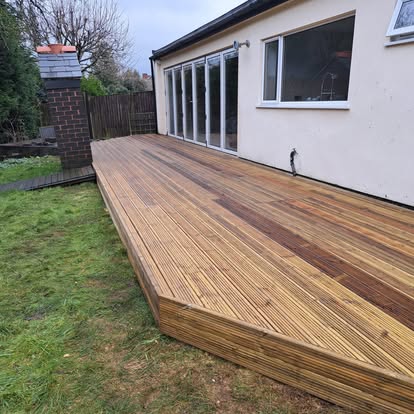 Full timber deck area viewed from garden