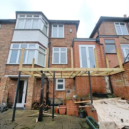 Elevated deck frame, steel posts and timber joists